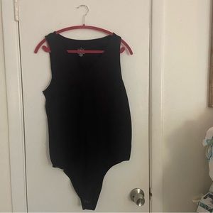 NWT Torrid Black Bodysuit. Size 2 (18/20) New With Tags.